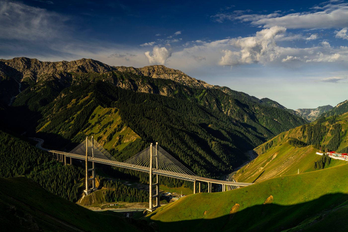 Guozigou Bridge in Xinjiang seen from the valley floor at dusk