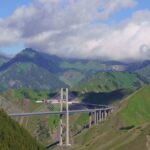 Guozigou Bridge, the cable-stayed highway crossing the Tianshan valley near Sayram Lake in Xinjiang